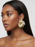 Boucle d’oreille en forme de fleur